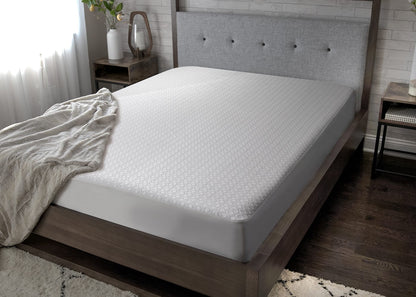 BedGear Dri-Tec King Mattress Protector white with a subtle geometric pattern on a king bed on Tampa Home & Garden Store