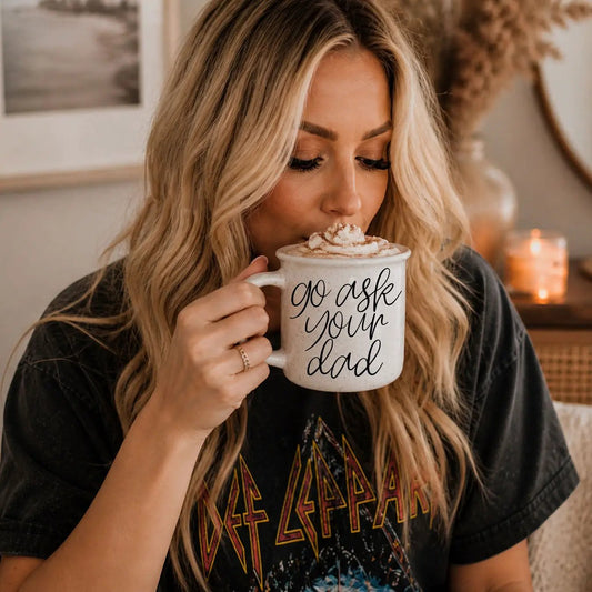 Gia Roma go ask your dad mug, speckled white ceramic with black script, held while sipping on Tampa Home & Garden Store