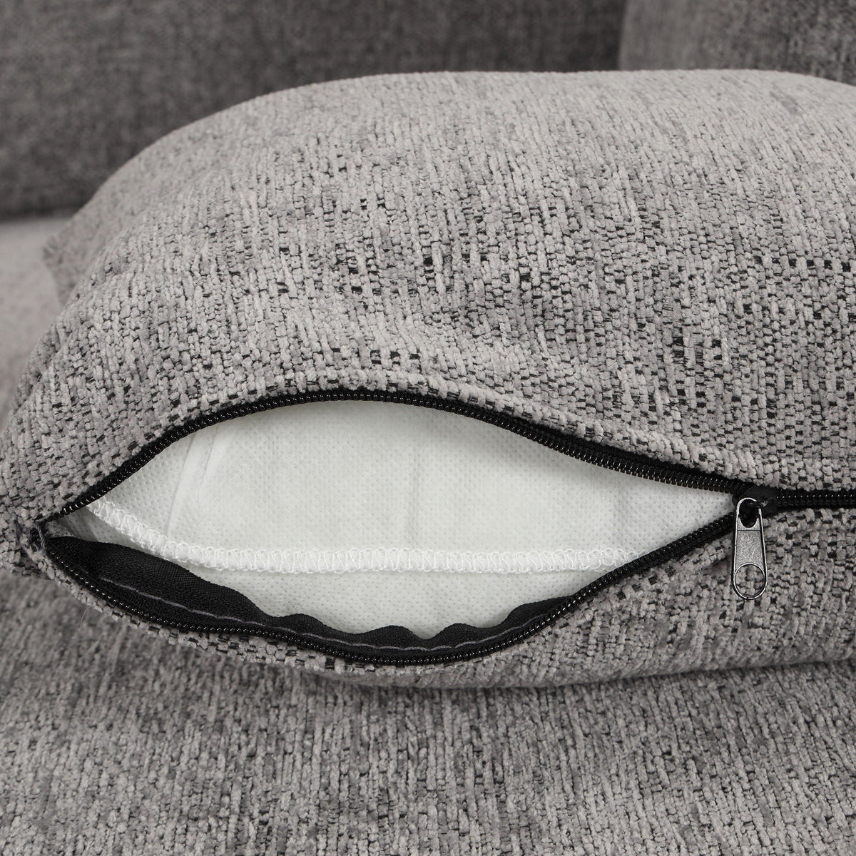 U-shaped sectional sofa cushion close-up in gray textured fabric with zipper edge on Tampa Home & Garden Store
