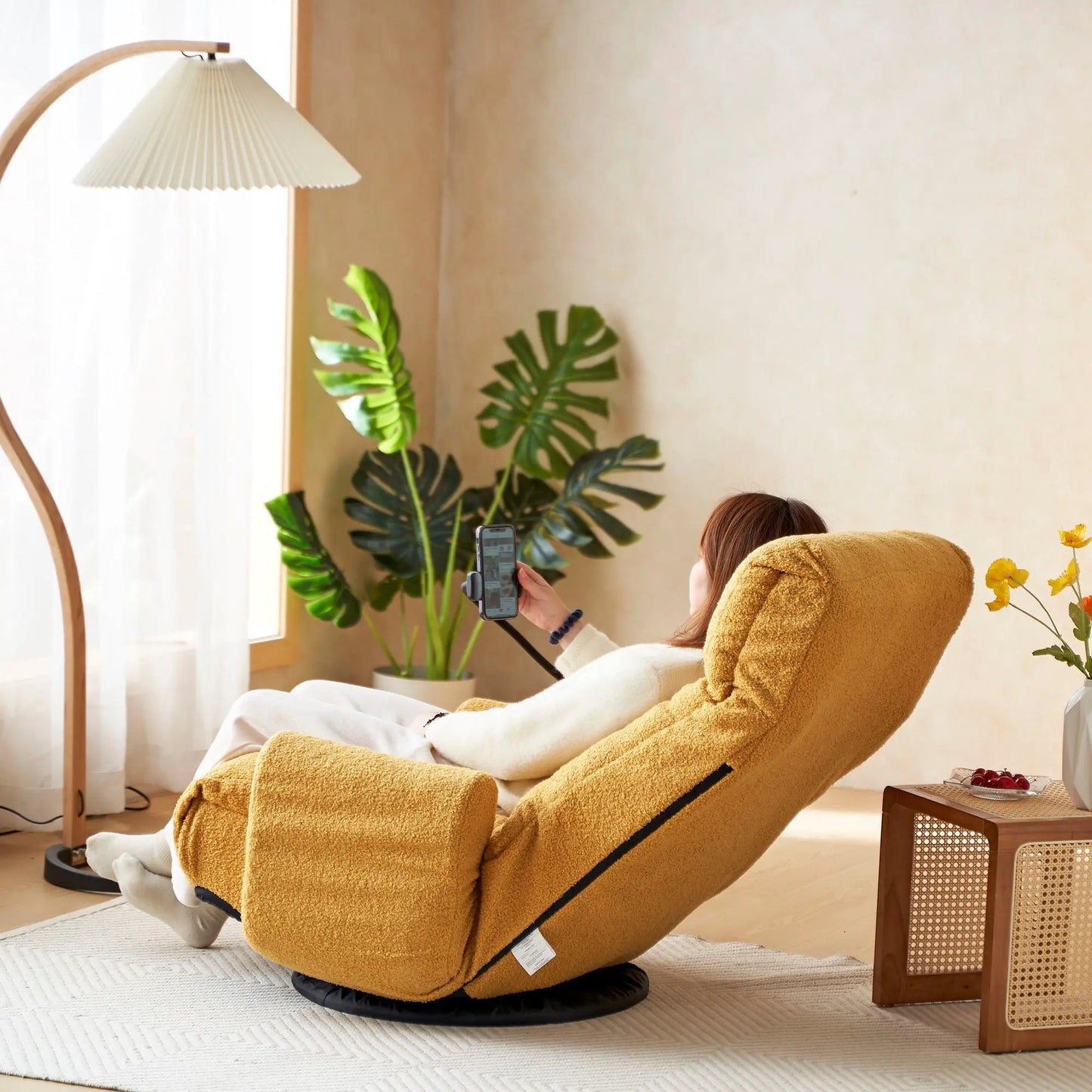 Adjustable Swivel Lounge Chair in tan plush fabric with headrest 360° rotating seat in room on Tampa Home & Garden Store
