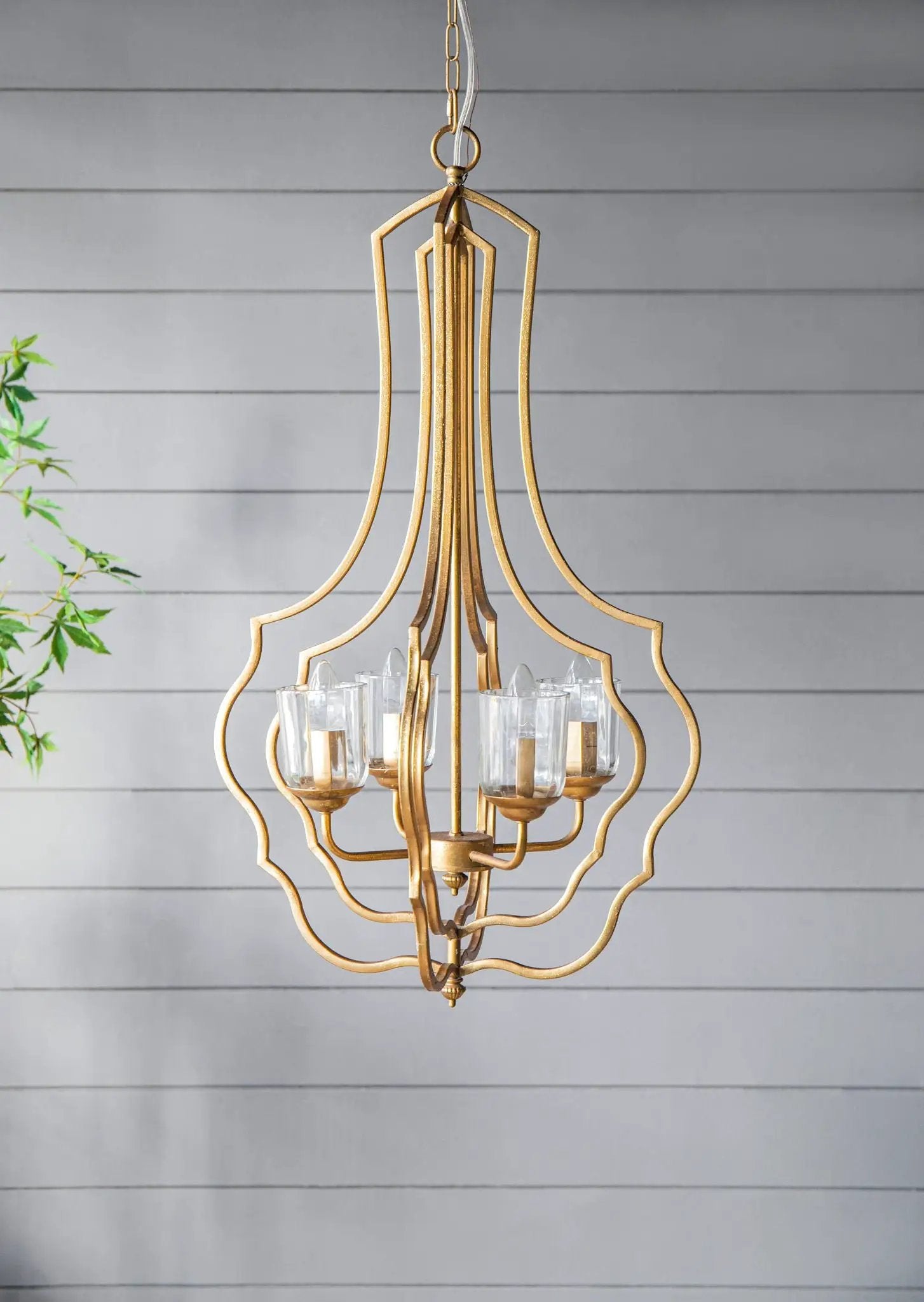 4-light gold metal chandelier with adjustable chain and glass candle cups on Tampa Home & Garden Store