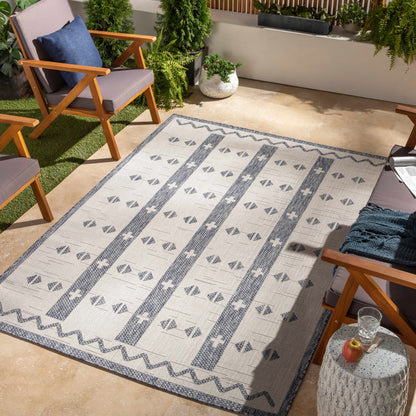 Dapitan Indoor & Outdoor Rug by Boutique Rugs cream with navy geometric border for outdoor use on Tampa Home & Garden Store