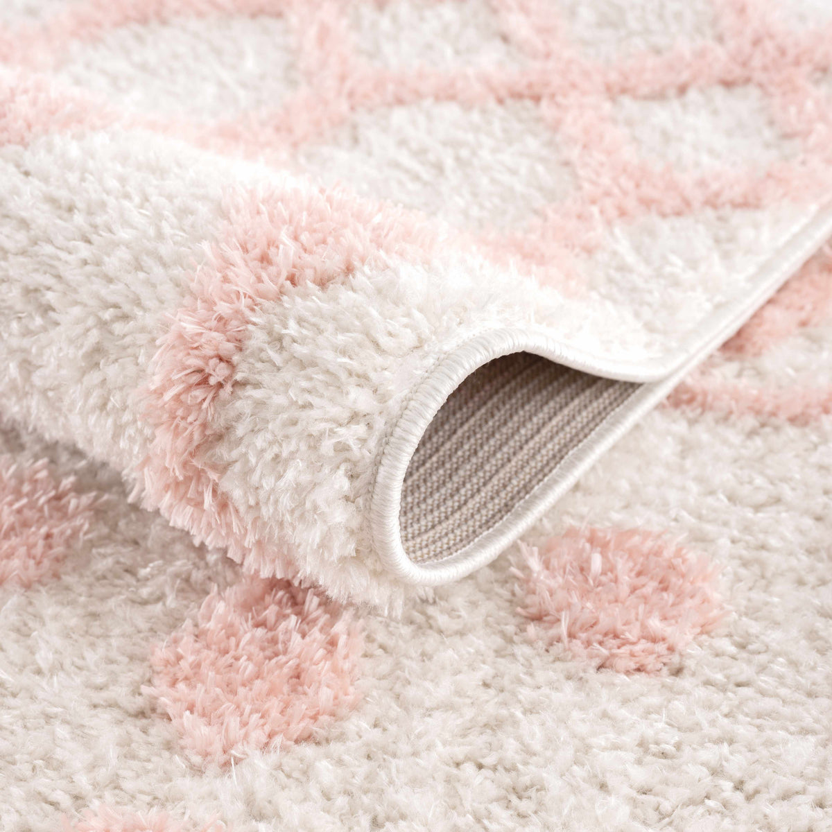 Darva pink plush area carpet with soft shag in pink and white gradient and white binding edge on Tampa Home & Garden Store