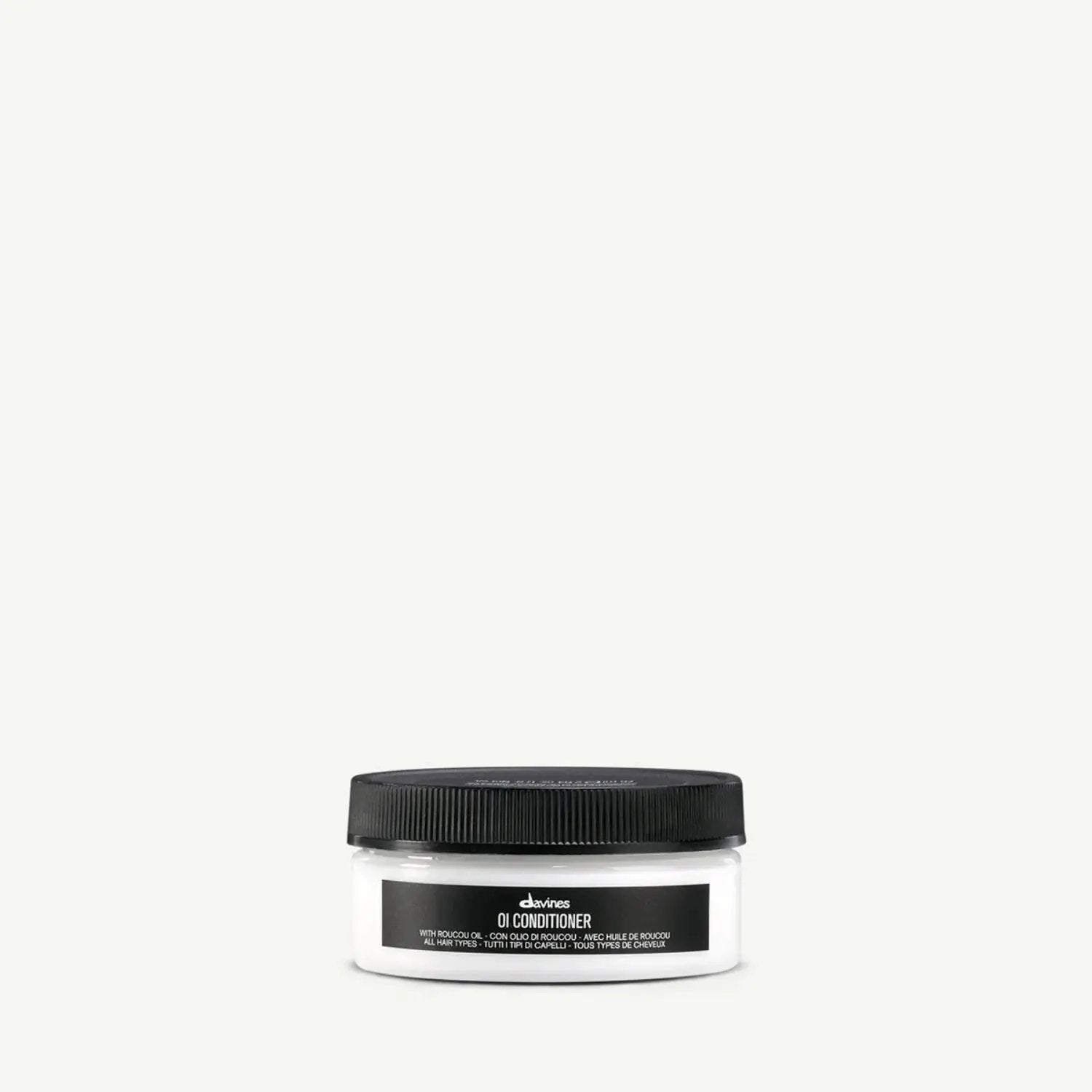 Davines OI Conditioner jar, white container with black lid, Davines label visible on Tampa Home & Garden Store