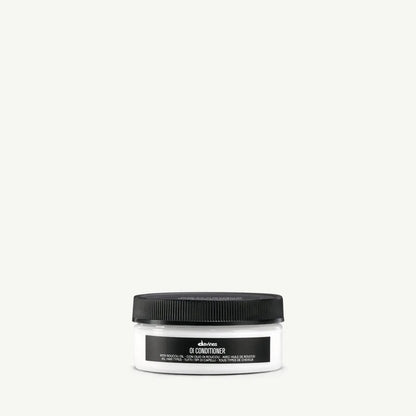 Davines OI Conditioner jar, white container with black lid, Davines label visible on Tampa Home & Garden Store