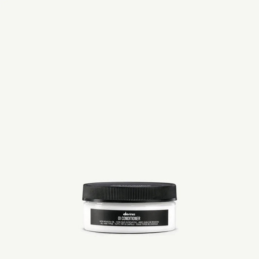Davines OI Conditioner jar, white container with black lid, Davines label visible on Tampa Home & Garden Store