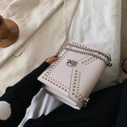 White leather shoulder bag with silver rivet studs and a chain strap, small crossbody bag on Tampa Home & Garden Store