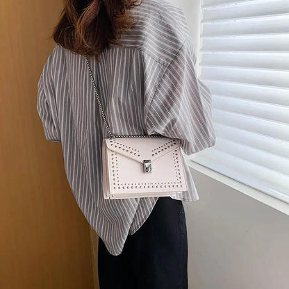 Stevvex Dazzling Scrub Leather Shoulder Bag blush pink with studded rivet trim and chain strap on Tampa Home & Garden Store