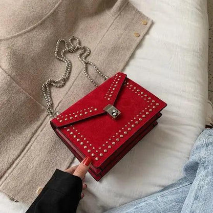 Stevvex red studded leather shoulder bag crossbody with chain strap and rivet trim on Tampa Home & Garden Store
