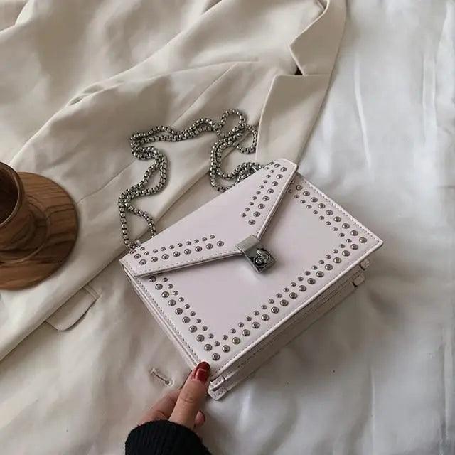 Stevvex white leather shoulder bag with silver studs and chain strap, small crossbody with flap on Tampa Home & Garden Store