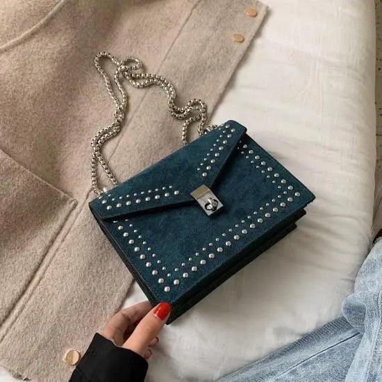 Stevvex teal suede shoulder bag with silver rivet studs and chain strap crossbody style on Tampa Home & Garden Store