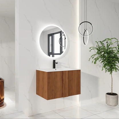 Floating bathroom vanity with sink, wood finish, black faucet, round backlit mirror on Tampa Home & Garden Store