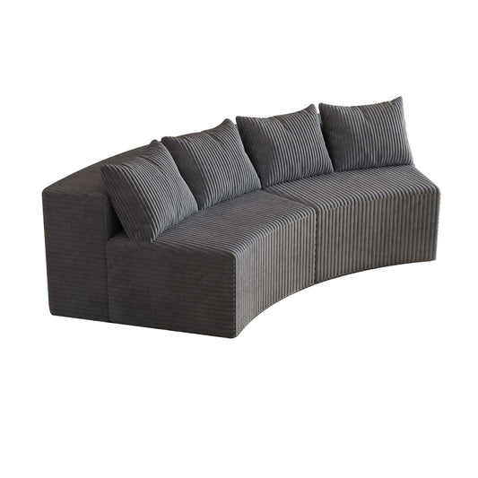 Curved sectional sofa with 4 pillows in dark gray corduroy, stationary modular design on Tampa Home & Garden Store