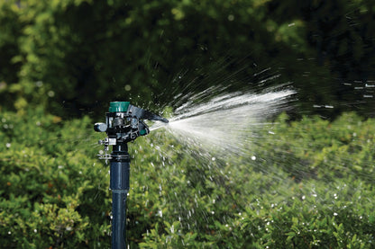 1/2 in MPT impact sprinkler head with weighted arm Orbit Irrigation spraying water outdoors on Tampa Home & Garden Store