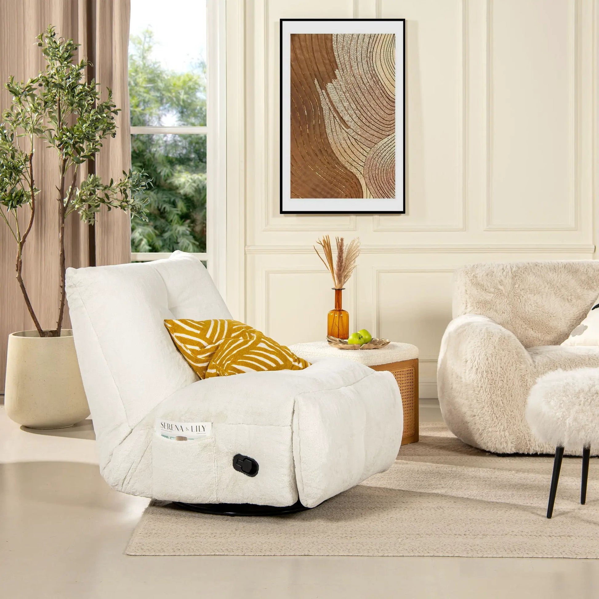 Rearden swivel glider manual recliner in cream fabric with round black base in a living room on Tampa Home & Garden Store