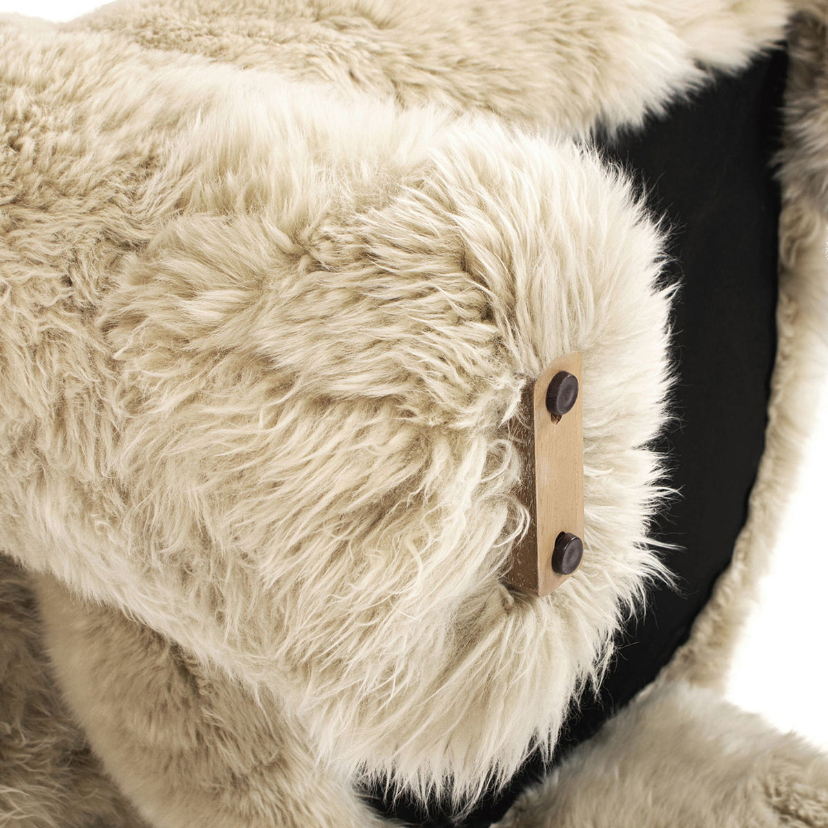 Genuine sheepskin fur split barrel back accent chair in natural blonde with sculptural base on Tampa Home & Garden Store