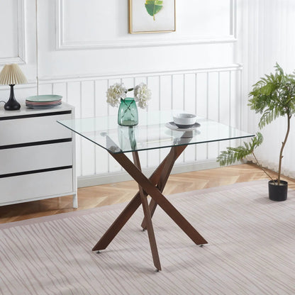 Dining table by Unique Piece Furniture with tempered glass top and cross wood legs on Tampa Home & Garden Store