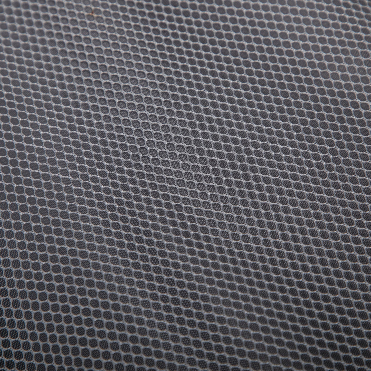Luggage fabric texture close-up in dark gray with dotted pattern HouseOfZazla on Tampa Home & Garden Store