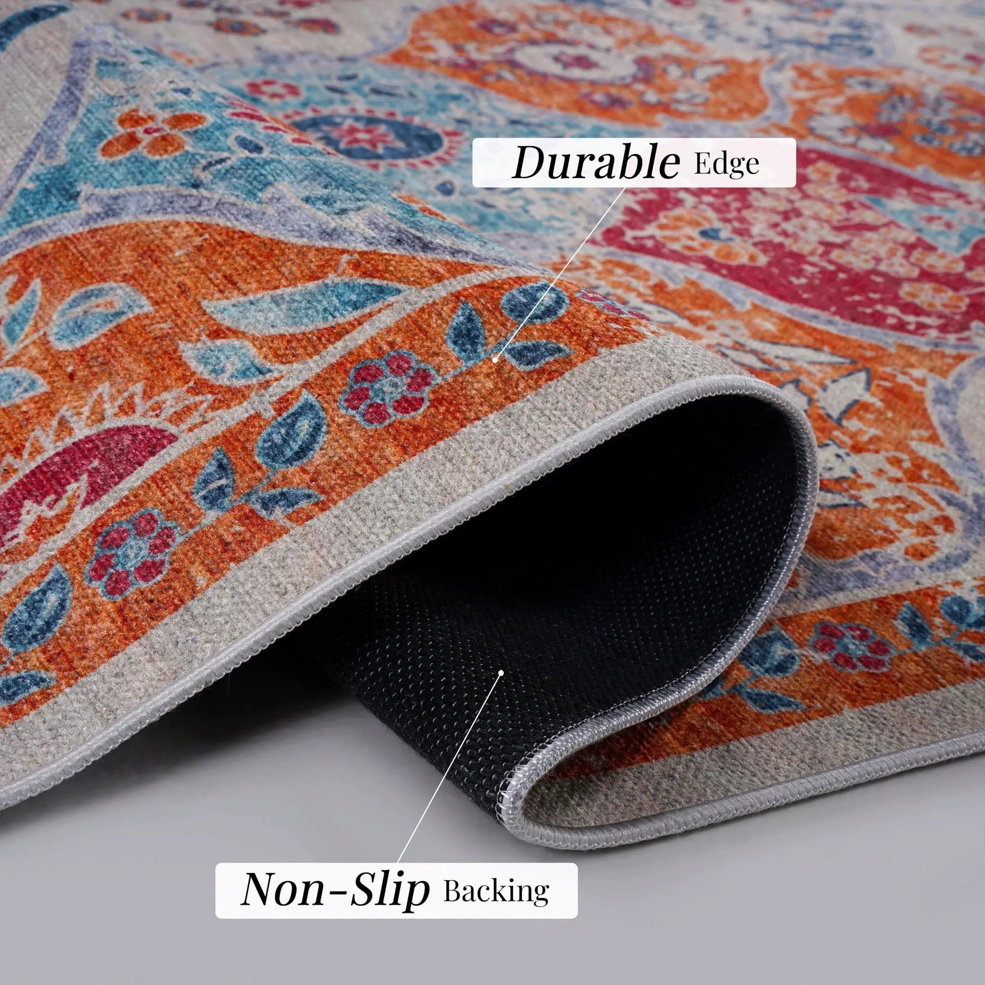 Maval washable area rug by Unique Piece Furniture in bold orange and teal on Tampa Home & Garden Store