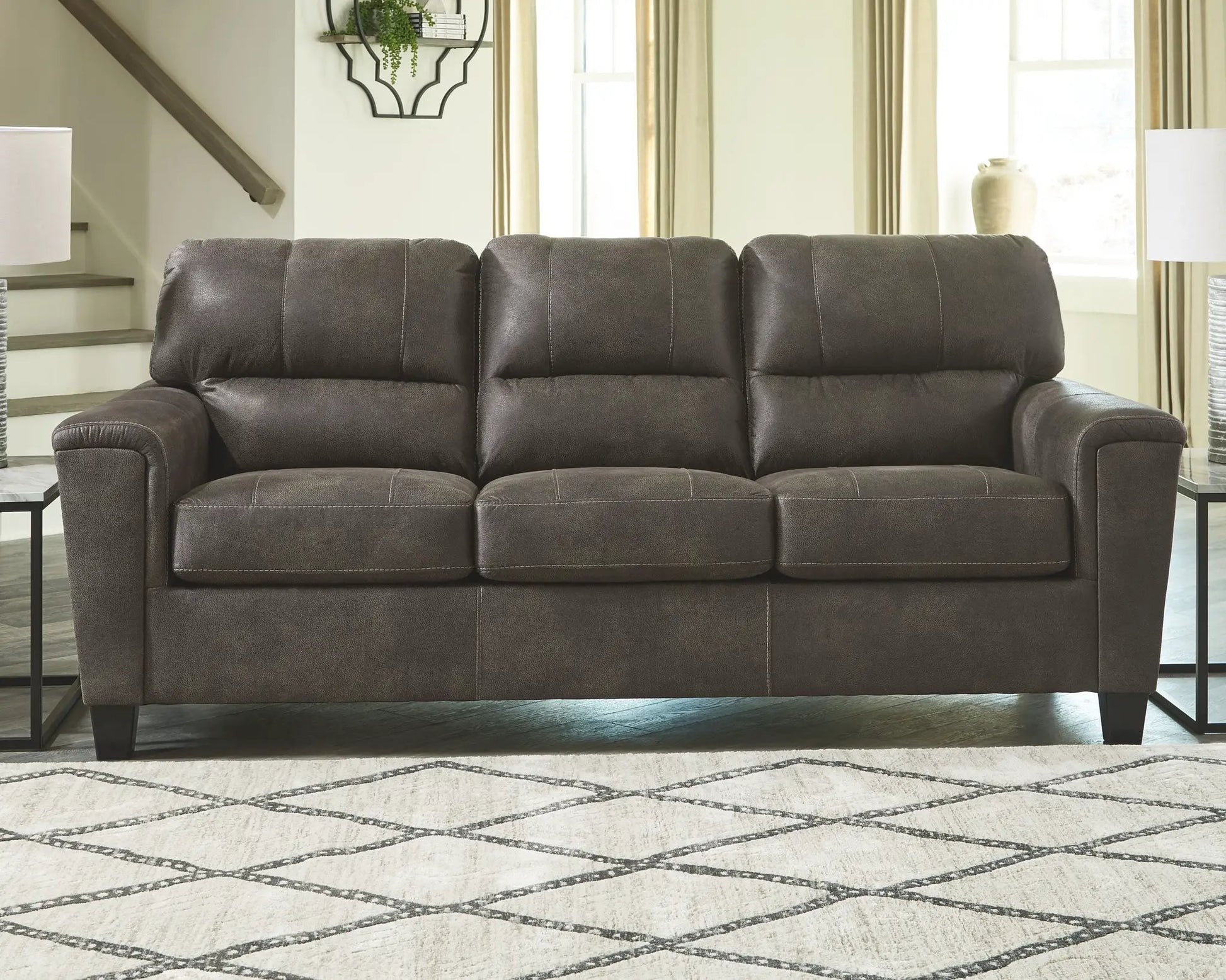 Navi Stationary Sofa dark brown leather-look with white contrast stitching three-seat on Tampa Home & Garden Store