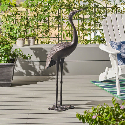 Sunny Outdoor 43 Inch Aluminum Crane statue with shiny black finish on a patio deck on Tampa Home & Garden Store