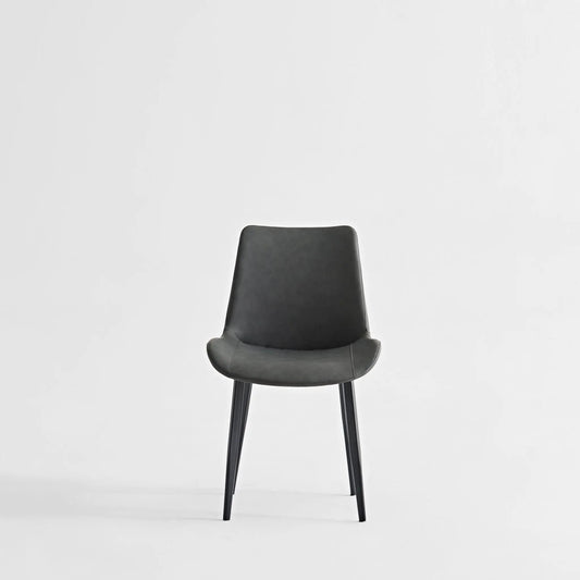 Gray dining chair by Unique Piece Furniture with padded back and black metal legs on Tampa Home & Garden Store