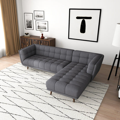 L-shaped tufted sectional sofa in dark gray with mid-century modern legs by HouseOfZazla on Tampa Home & Garden Store