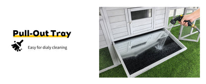 141in gray wooden chicken coop with nesting box and pull-out tray being rinsed with hose on Tampa Home & Garden Store