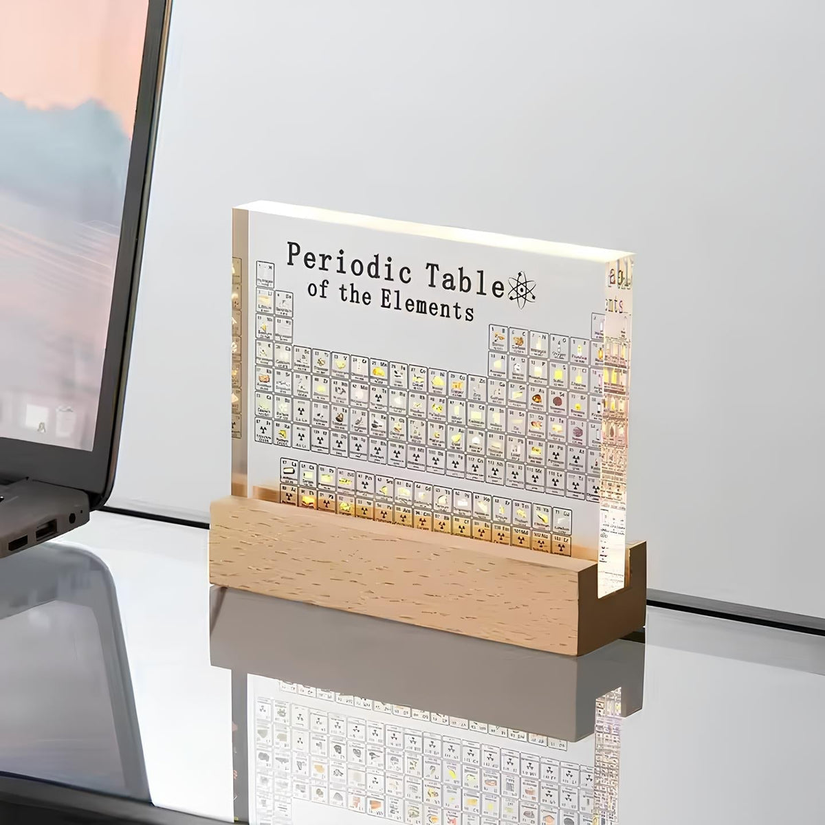 LED Periodic Table Element Display by Moktan Sabai on white backlit panel on wood base on Tampa Home & Garden Store