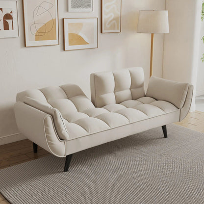 Soft beige futon sofa with two armrests in a cozy living space by Unique Piece Furniture on Tampa Home & Garden Store
