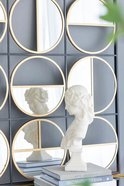 Eclectic styling metal beaded wall mirror set with circular gold-tone frames in a grid on Tampa Home & Garden Store