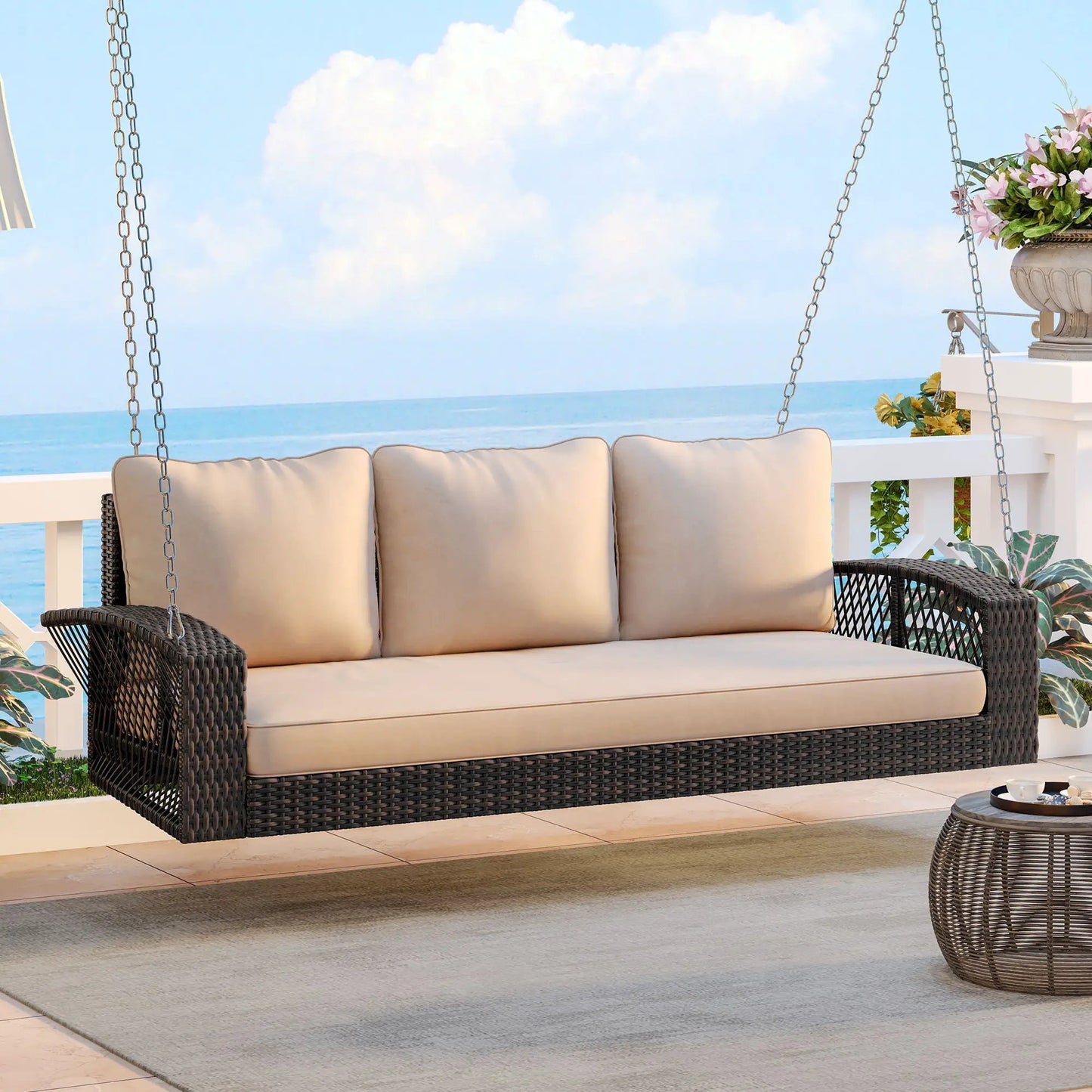 3 Person Large Patio Swing Bench with Beige Cushions on dark wicker by seaside deck on Tampa Home & Garden Store