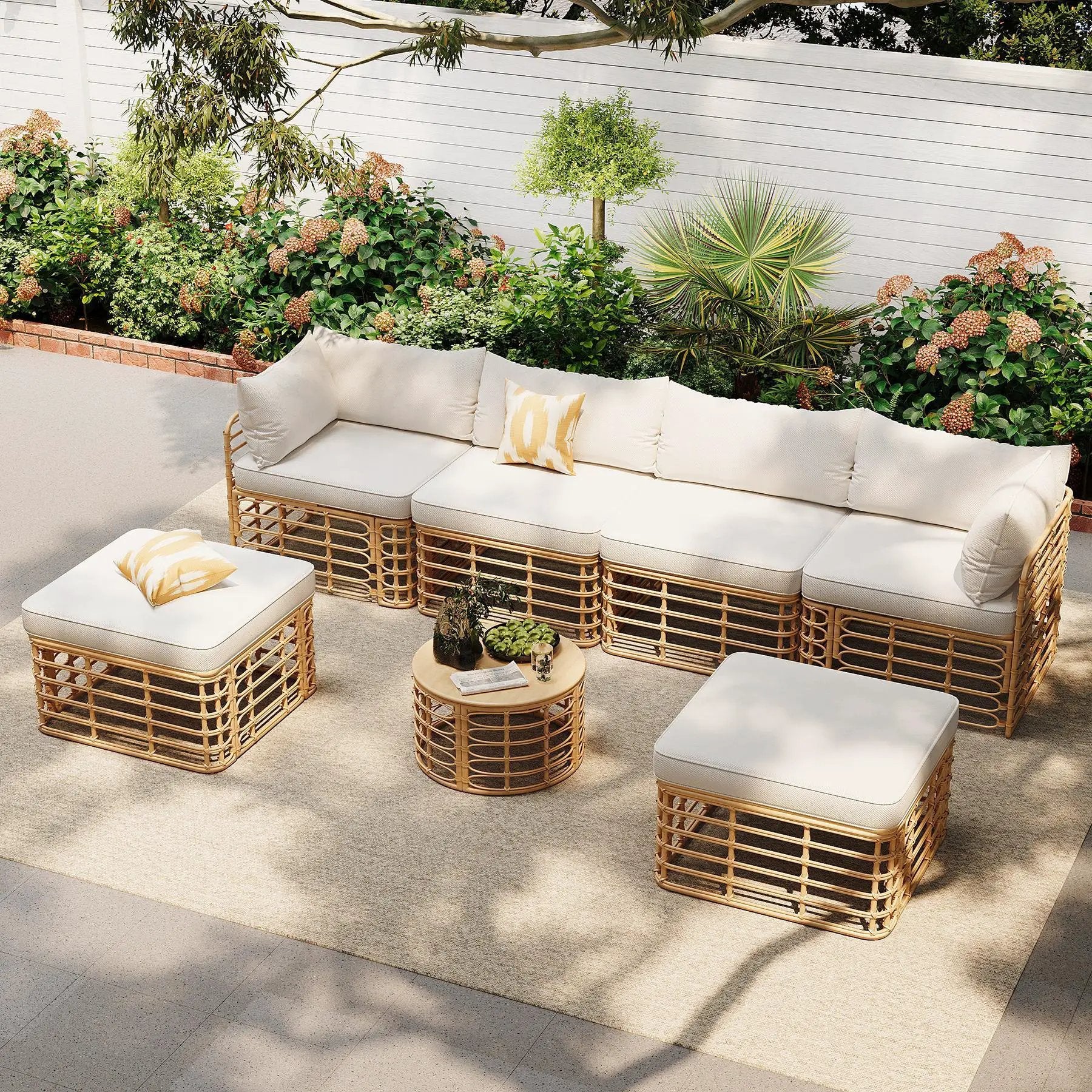 7-Piece outdoor rattan sectional sofa set with thick cream cushions and pillows on Tampa Home & Garden Store