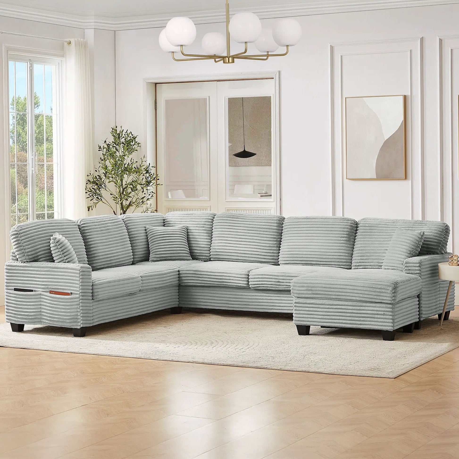 U-shaped upholstered sectional in light gray ribbed fabric with movable ottoman and pockets on Tampa Home & Garden Store