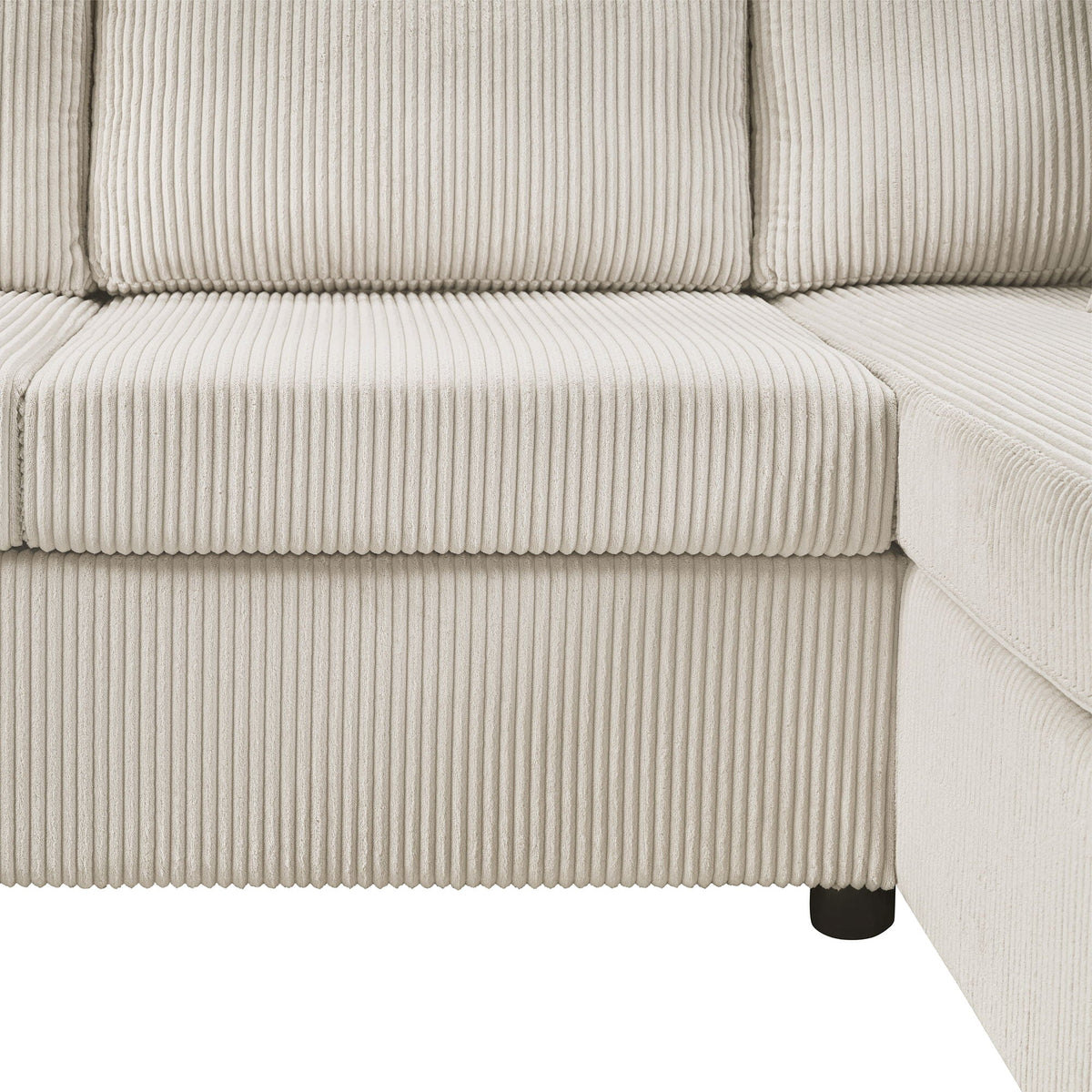 Oversized U-shaped sectional sofa with chaise in beige corduroy upholstery and three pillows on Tampa Home & Garden Store
