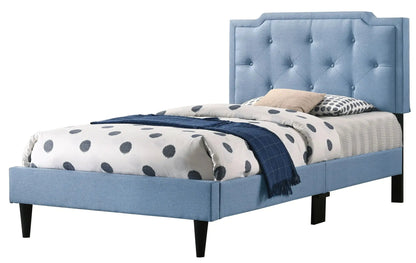 Blue button-tufted upholstered bed with tall headboard and black tapered legs on Tampa Home & Garden Store