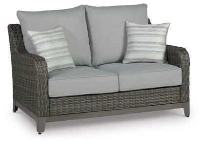 Elite Park gray loveseat with light gray cushions and dark wicker frame on Tampa Home & Garden Store