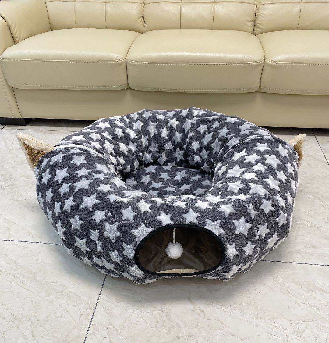 Cat tunnel sleeping nest in gray star-pattern fabric with front entry and hanging pom-pom toy on Tampa Home & Garden Store
