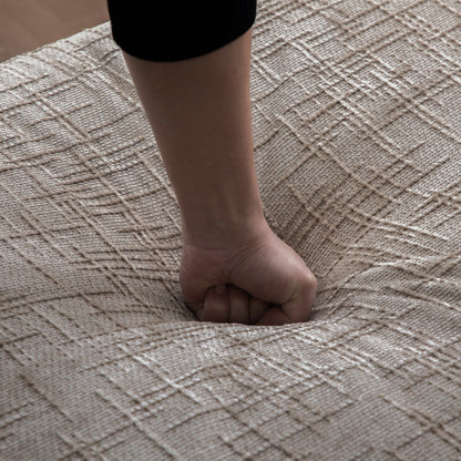 Bare leg and foot on a textured beige carpet with a black garment edge visible on Tampa Home & Garden Store