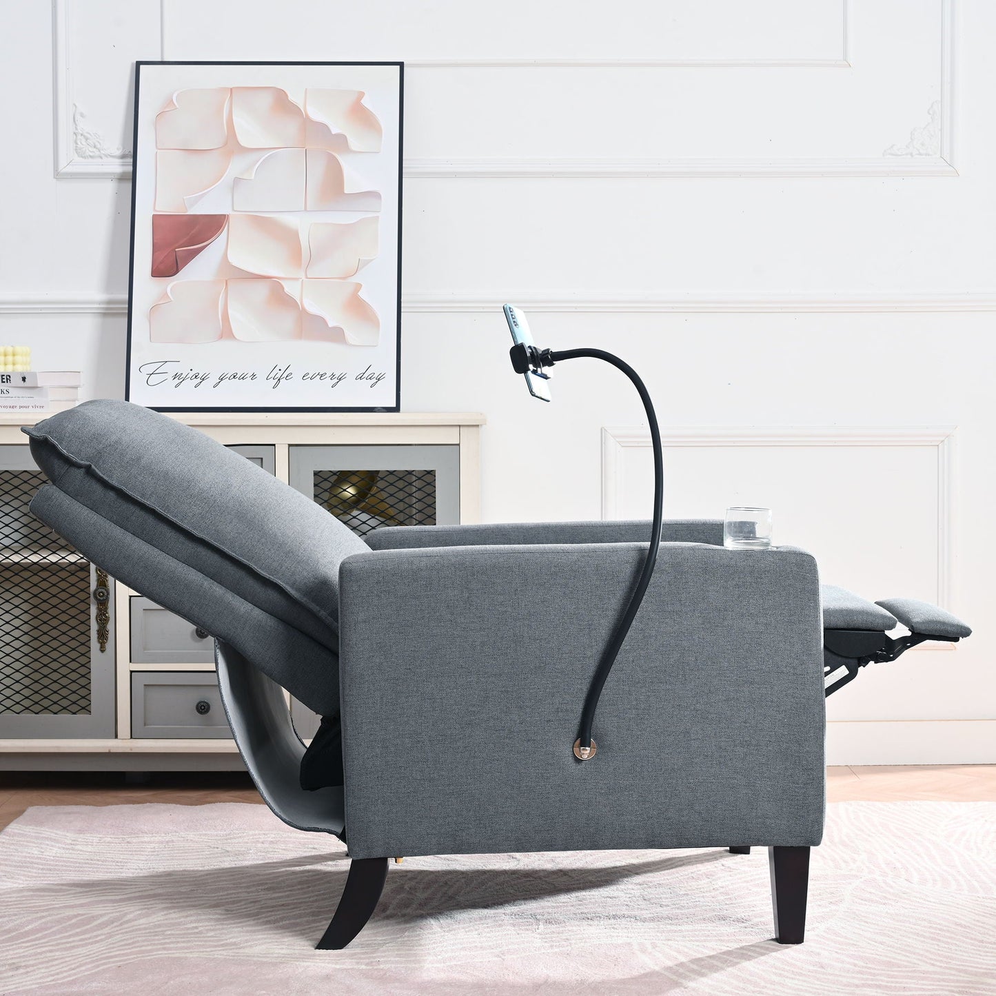 Gray fabric reclining chair with extended footrest in a modern living room on Tampa Home & Garden Store