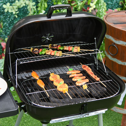 Outsunny 21' Portable Charcoal Grill with wheels and bottom shelf grilling colorful skewers on Tampa Home & Garden Store