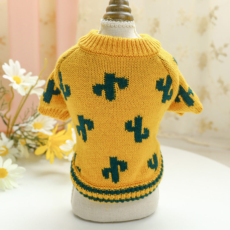 Bowknot yellow hollow-knit dog sweater with teal clover motifs by Pet Zen on Tampa Home & Garden Store
