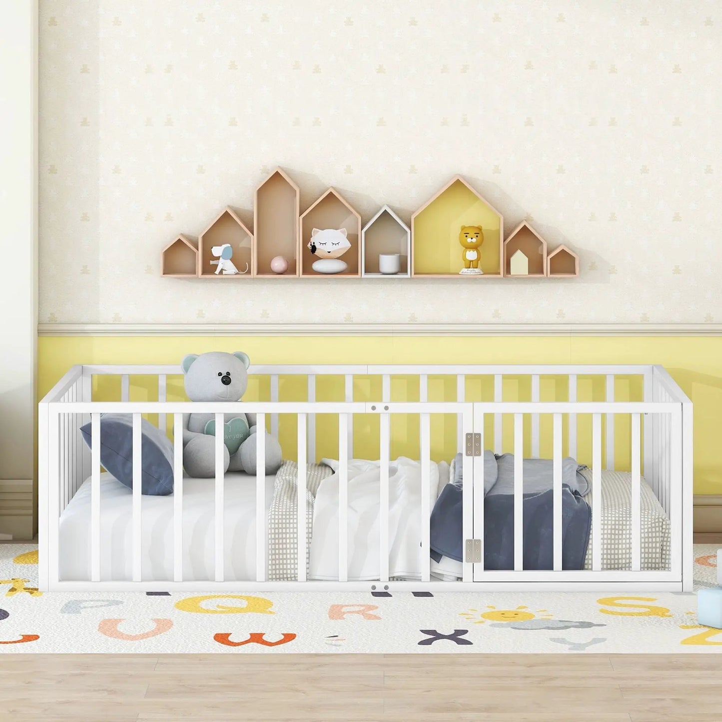 Metal floor bed frame with fence-style rails and door, white finish in a nursery setting on Tampa Home & Garden Store