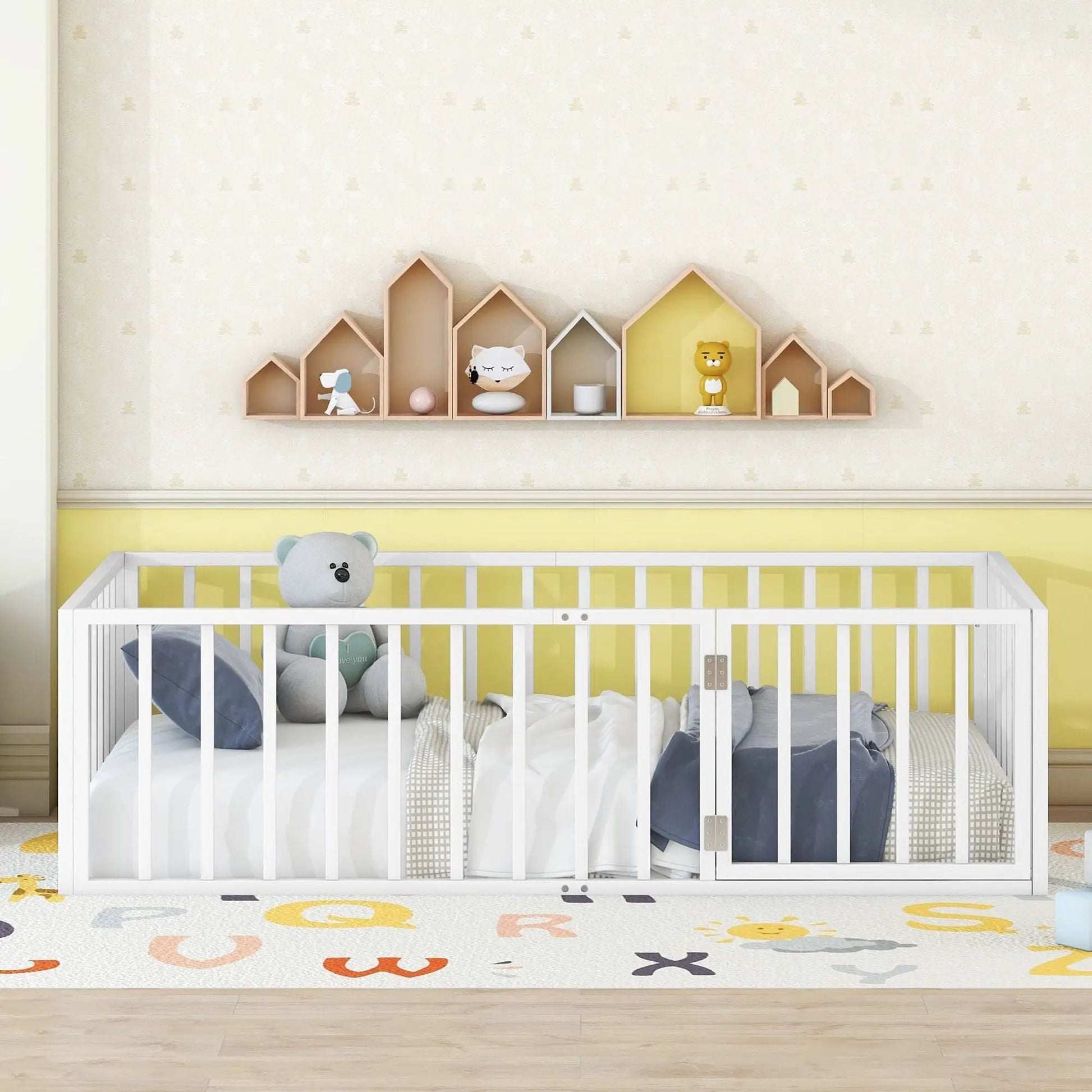 Metal floor bed frame with fence-style rails and door, white finish in a nursery setting on Tampa Home & Garden Store