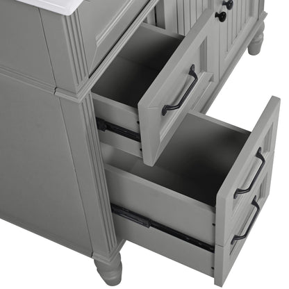 Bathroom vanity with sink, freestanding solid wood cabinet in gray finish with open drawers and black handles on Tampa Home & Garden Store