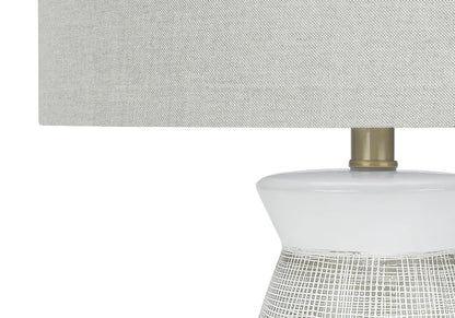 Table lamp with gray fabric shade and white ceramic grid base, brass neck by Unique Piece Furniture on Tampa Home & Garden Store