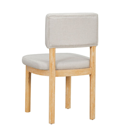 Dining chair beige upholstered fabric with natural wood legs on Tampa Home & Garden Store