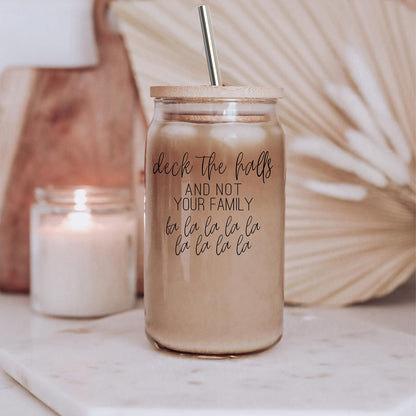 Deck the Halls 17oz glass cup drinkware with metal straw beige iced beverage on Tampa Home & Garden Store