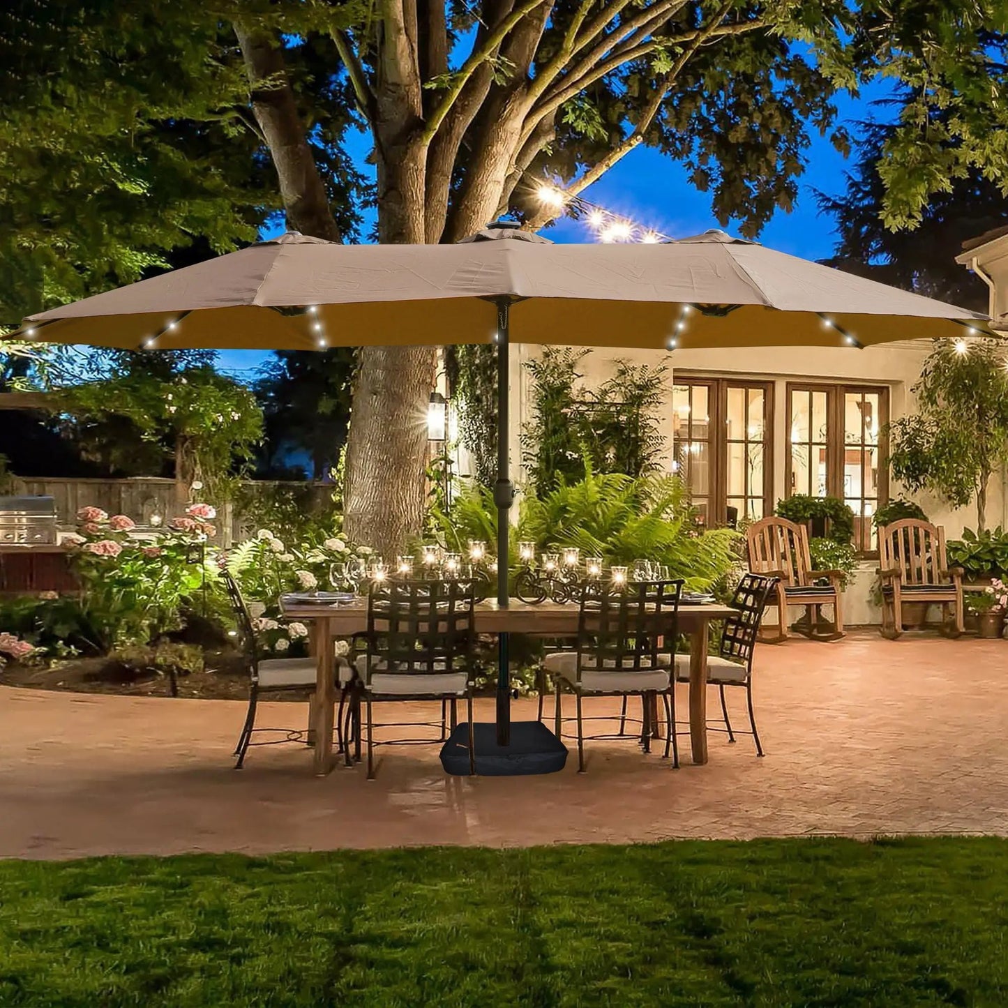 Double- Sided Outdoor Market Umbrella With Lights And Base beige canopy with black pole on Tampa Home & Garden Store
