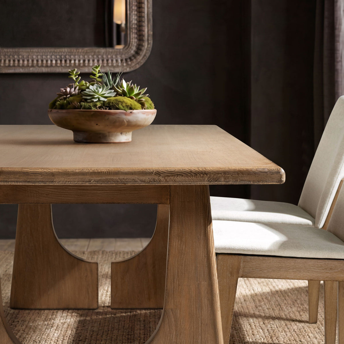 Antique brown 8-seater dining table in reclaimed pine with grain and a succulent centerpiece on Tampa Home & Garden Store